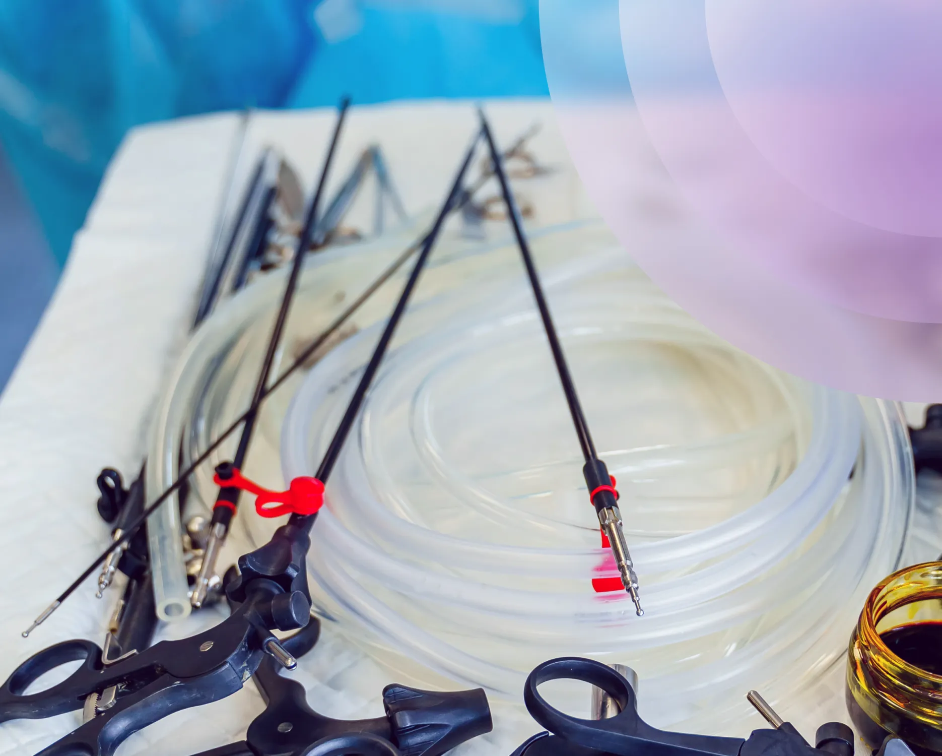 Close-up of a surgeon operating in a sterile environment using surgical instruments.