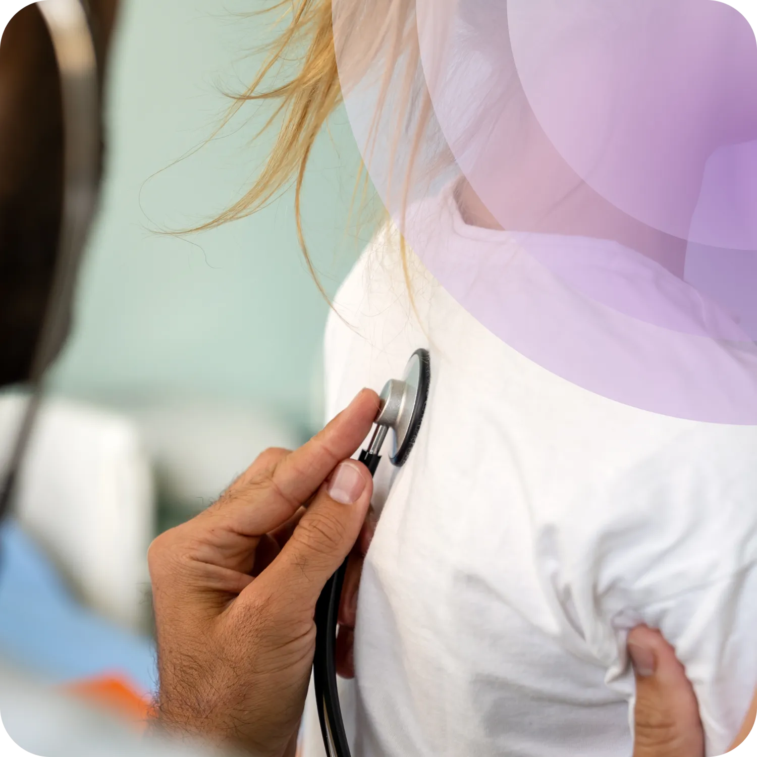 Consultant assessing a patient for pelvic organ prolapse